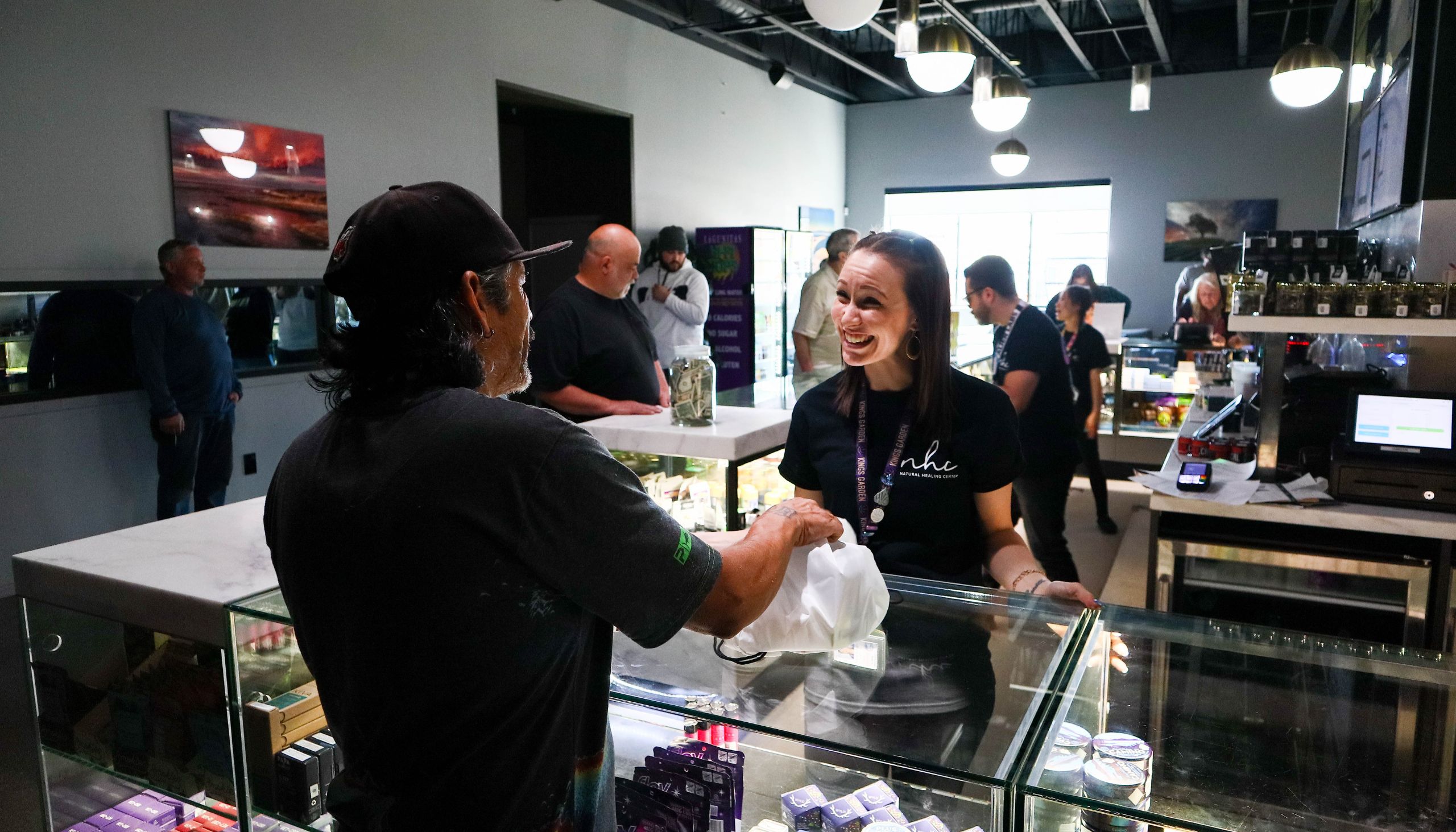 Top Grover Beach cannabis dispensary Natural Healing Center interacting with customers